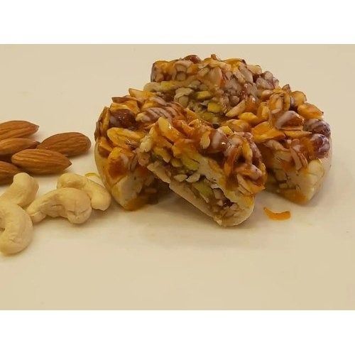 Mouth Watering Taste And Delicious Brown Dry Fruit Laddu For Sweet Dessert 