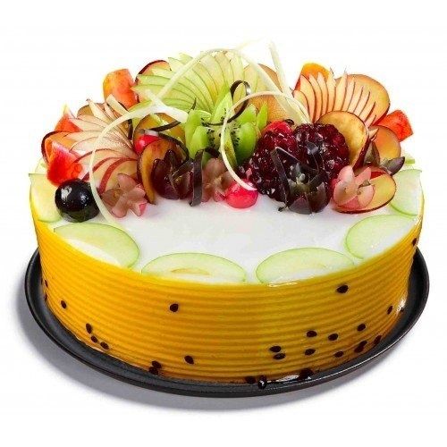 Fresh Sweet And Delicious Round Pineapple Cake Topped With Real Fruits For Parties