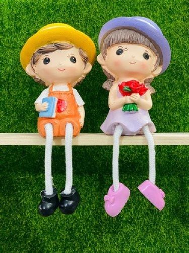 Multi Colour Stylish And Modern Cute Bench Couple Hanging Legs Showpiece For Decoration