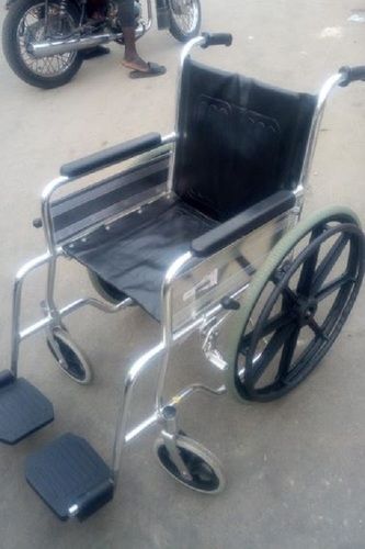 Stainless Steel Body Black And Silver Foldable Wheelchair With 50 Kg Load Capacity 