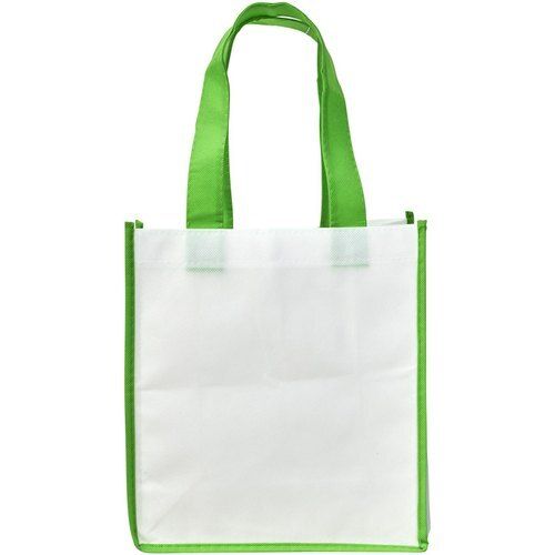 Easy To Use Plain Dyed Environment Friendly White And Green Colored Plain Non Woven Bag