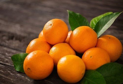 Naturally Grown Antioxidants And Vitamins Enriched Healthy Farm Fresh Sweet And Tasty Orange