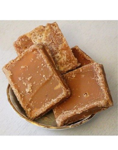 Sweet Healthy And Tasty Hygienically Prepared Natural Orange Jaggery 