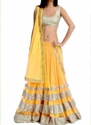 Modern Party Wear Yellow Color Fancy Design Lehnga Choli And Shining Looks