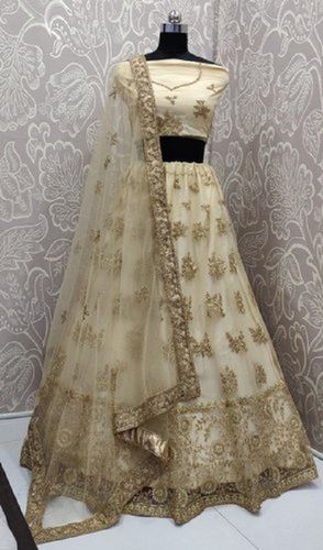 Women Heavy Embroidered Beautiful Designer Cream Net Lehenga Choli