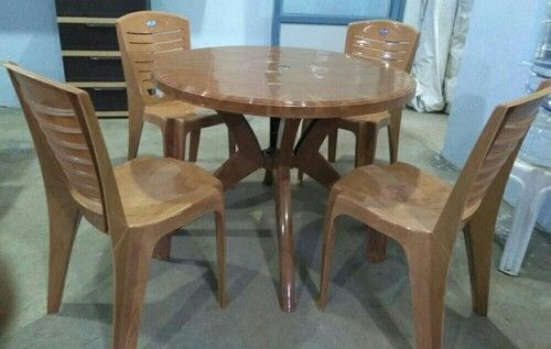 Lightweight And Durable Four Seater Round Brown Plastic Dining Table Set