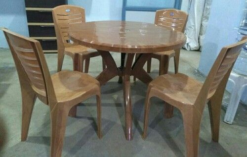 Plastic round best sale dining table set