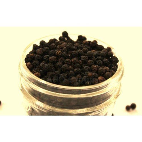 A Graded Raw Round Shaped Dry Place Storage Containing Dried Spicy Black Pepper