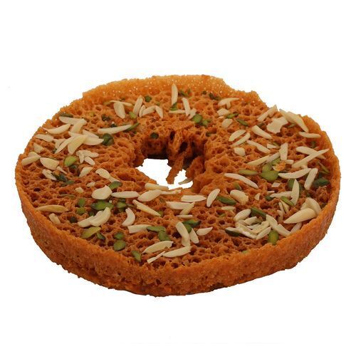 Sweet Unique And Crisp Disc-Shaped Rajasthani Dessert Made With Ghevar