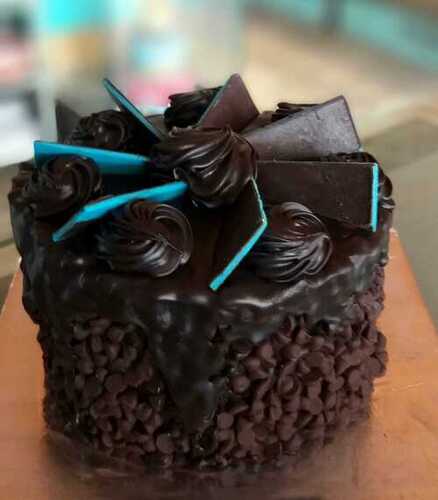 Sweet Mouth Watering Tasty And Fresh Delicious Soft Creamy Round Chocolaty Cake