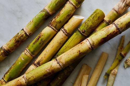 Sweet And Delicious Taste Yellow And Green Sticks Sugarcane