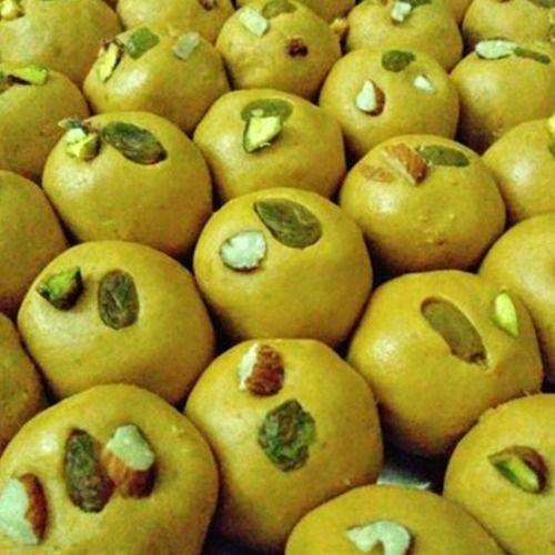 Healthy And Delicious Sweet In Taste Round Shaped Yellow Besan Laddu  Carbohydrate: 38.1 Grams (G)