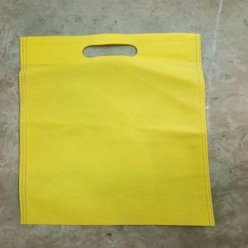 With Handle Light Weight Reusable And Biodegradable Plain Yellow Non Woven Carry Bags 