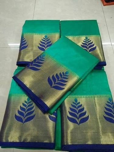 ग्रीन डिज़ाइनर वियर मॉडर्न और ट्रेंडी ज़री वर्क स्वास्तिक क्रिएशन प्लेन लेंथ 5.5 मीटर टसर सिल्क साड़ी