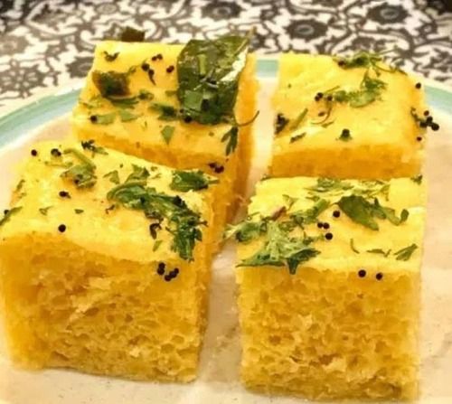 Yellow Yummy And Salty Taste Soft Smooth Dhokla With 1Kg Plastic Bag Pack  Grade: A