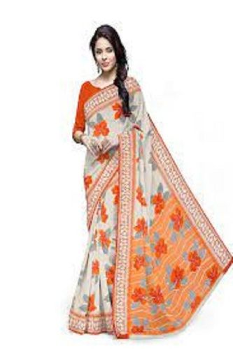 Ladies Fashionable Comfortable And Skin Friendly Orange Printed Cotton Saree 