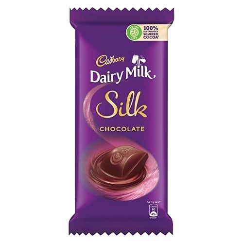 Regaling In The Chocolate'S Richness And Creaminess And Brown Colour Cadbury Dairy Milk Silk Chocolate Bar