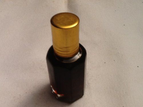 Red Natrual And Woody Brown Oudh Attar, Liquid Form, Packaging Type: Glass Bottle