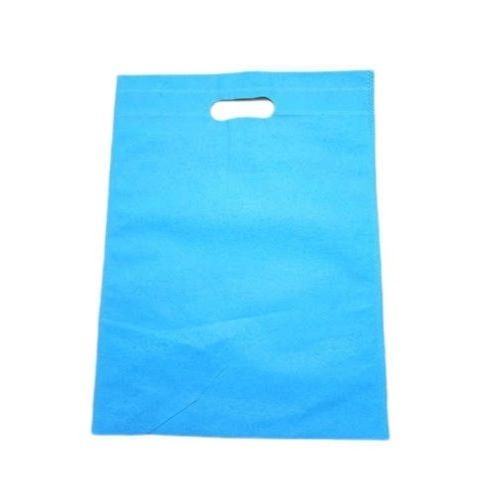 Environment Friendly Plain Dyed Blue D Cut Non Woven Carry Bags