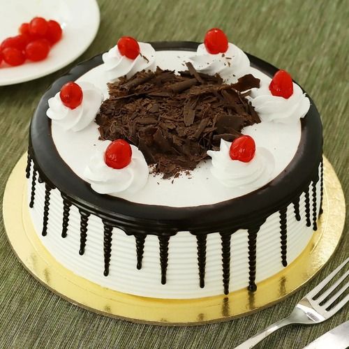 Delicious And Sweet Egg Less Vanilla And Chocolate Flavor Cake