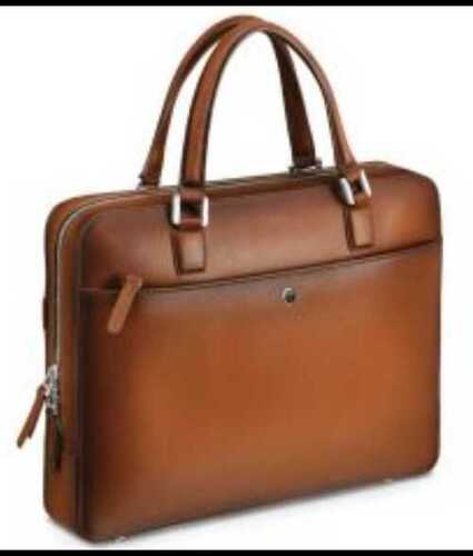 Ladies Brown Leather Bag With Hand Length Handle, Plain Pattern