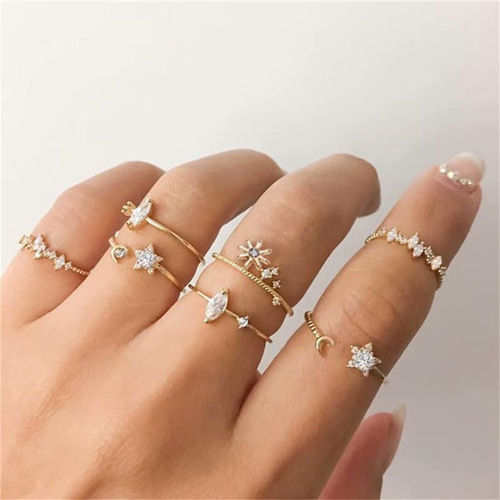 Gold Plated Seven Piece White Crystal Multi Designs Ring Set