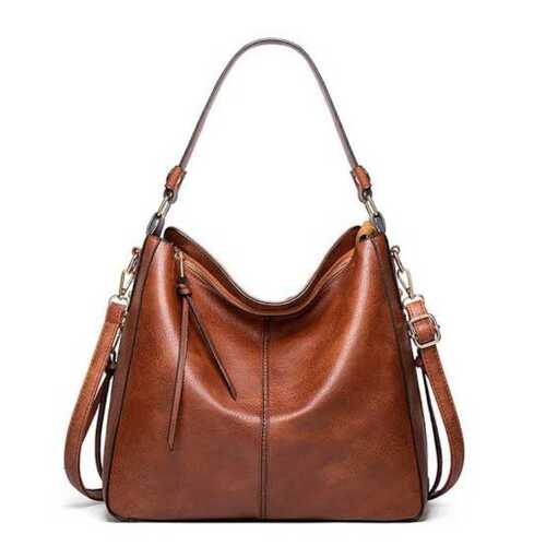 Ladies Brown Leather Bags, 100% Genuine Leather And Plain Pattern