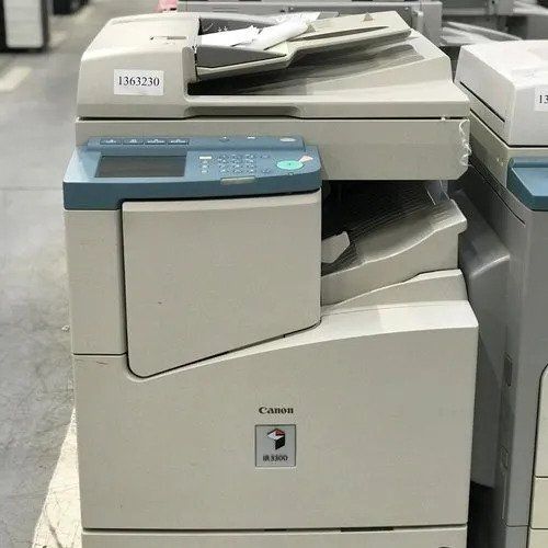 Brown Canon Photocopy Machine