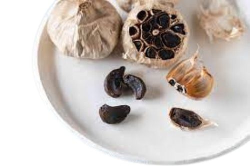 A Grade Dried Spicy Taste Solid Form Black Garlic For Use Cooking