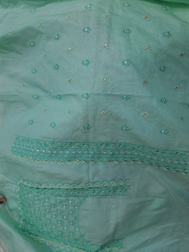 महिलाओं के लिए हल्का हरा ट्रेडिशनल इंडियन एम्ब्रॉयडरी किया हुआ अनस्टिच्ड ब्रीथेबल कॉटन सलवार सूट