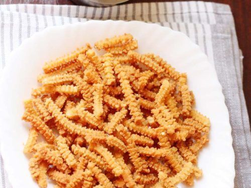 1 Kg Simple Crispy And Tasty Spicy Deep Fried Butter Murukku Ingredients: Rice Flour