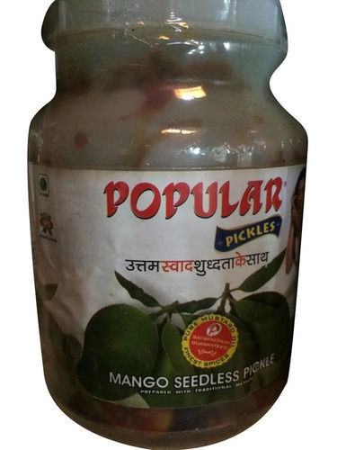 Salty And Sour Seedless Mango Pickle Served With Food