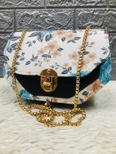 Modern Pu Leather Printed Lock Fitting Sling Bag For Ladies