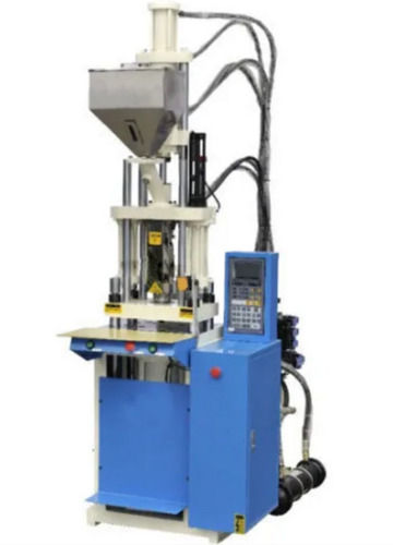 2.5 X 2 X 6 Foot Mild Steel Automatic Operated Vertical Injection Molding Machine Clamping Force: 68700 Newton (N)