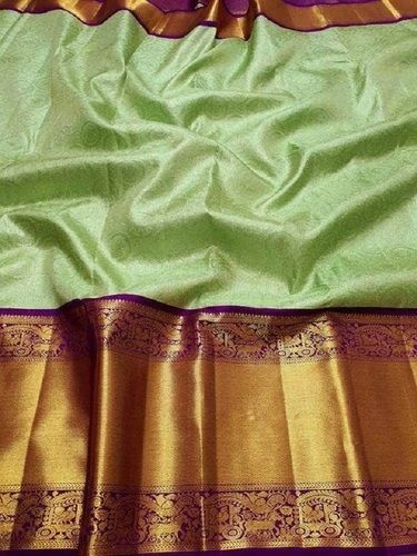 Green Ladies Tradition Wear Plain Pattern Broad Border Silk Saree