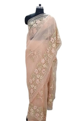 क्रीम त्वचा के अनुकूल और आरामदायक पार्टी वियर प्लेन ऑर्गेंज फैंसी साड़ी