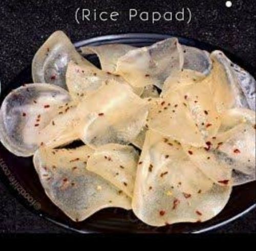 Round Shape Salty Rice Papad Served With Dinner