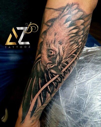 Baphomet arm tattoo - Black Rose Tattoo Shop