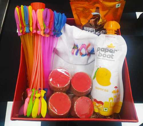 Holi Gift Hamper (Gulal, Cap, Chocolate, Water Balloon And Juice Packet)