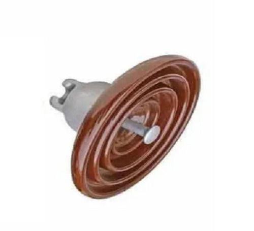 Dark Brown Porcelain Disc Insulators For Electrical Systems Capacity: 3000 Piece/Day Kg/Day