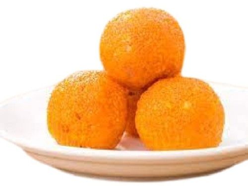 Yellow Tasty Round Shape Hygienically Packed Laddu