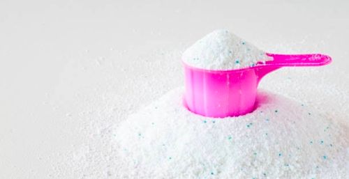 Pink Cup Or Scoop Of White Powder Detergent For Clothes Washing Dry  