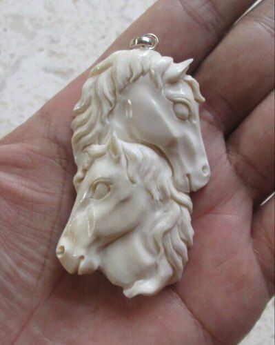 Double Horse Carved Bone Pendants