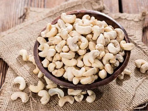 White Cashew Nut - Grade A, Curved Shape, Pure White Color, Available in Various Sizes - Rich in Taste, Long Shelf Life, No Harmful Preservatives, Easy to Digest, Packed with Health Benefits