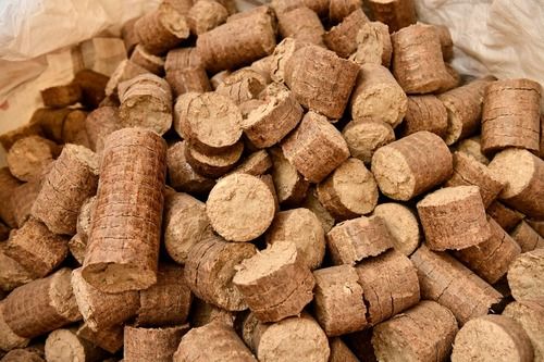 Brown Round Shape Wood Briquettes Used For Burning