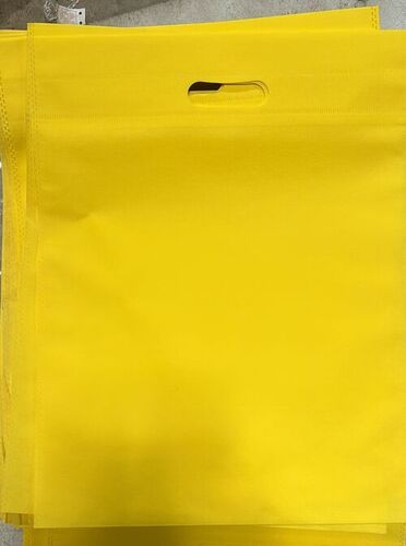 D Cut Premium Design And Eco Friendly Non Woven Bag - Yellow, Rectangular Shape, 1kg and 2kg Carry Capacity | Plain Pattern, Durable Material
