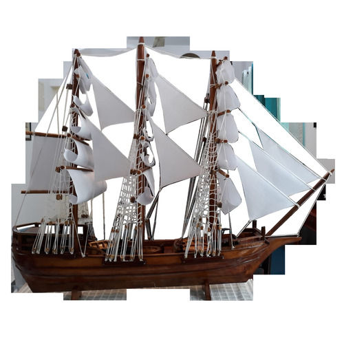 Wooden Sailing Ship with White Rigged Sails