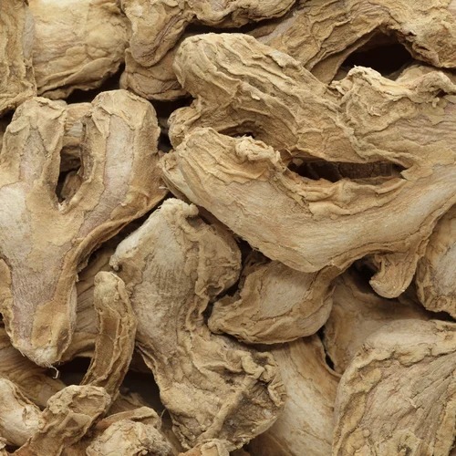 Dry Ginger Flakes - Grade A, Gunny Bag Packaging, 9-Month Shelf Life | No Artificial Flavors, Store in Cool and Dry Place