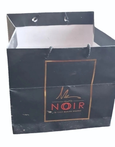 Eco-Friendly Black Paper Bag - 20x30 Inch, Flexiloop Handle, Tear-Resistant, Customizable Surface, Matte Finish, Durable, Lightweight Design, Stylish Multipurpose Use, Recyclable Packaging
