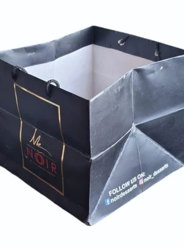 Eco-Friendly Shopping Paper Bag - 20x30 Inch , Matte Black, Flexible Flexiloop Handles, Lightweight, Tear-Resistant, Stylish Design, Customizable Surface, Recyclable Packaging